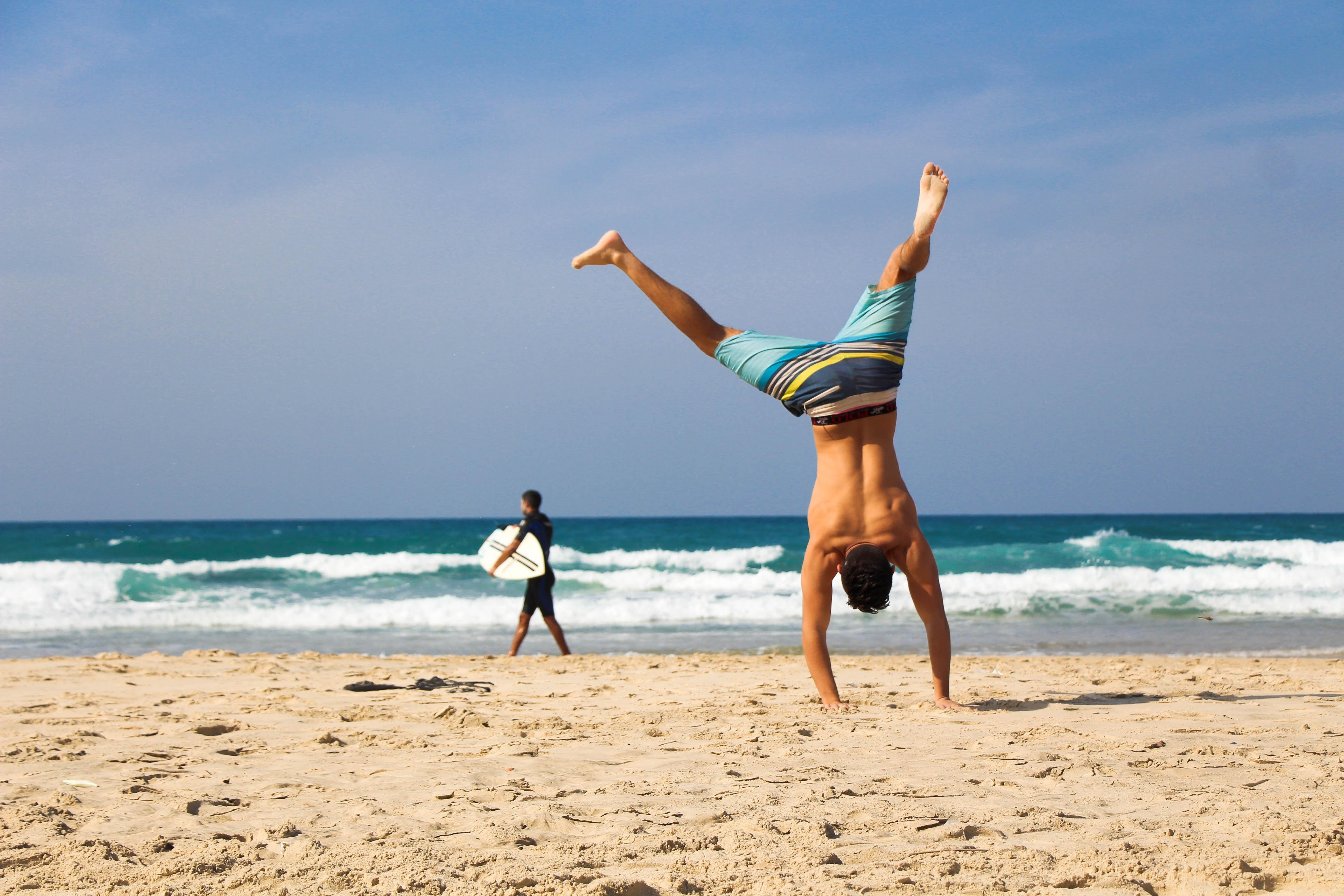 Photo by Pixabay: https://www.pexels.com/photo/man-doing-hand-stand-414012/